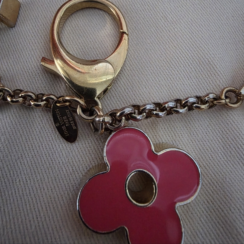 Authentic Louis Vuitton Floral Pink and Gold Key Holder a solid pink color - Picture 15 of 16
